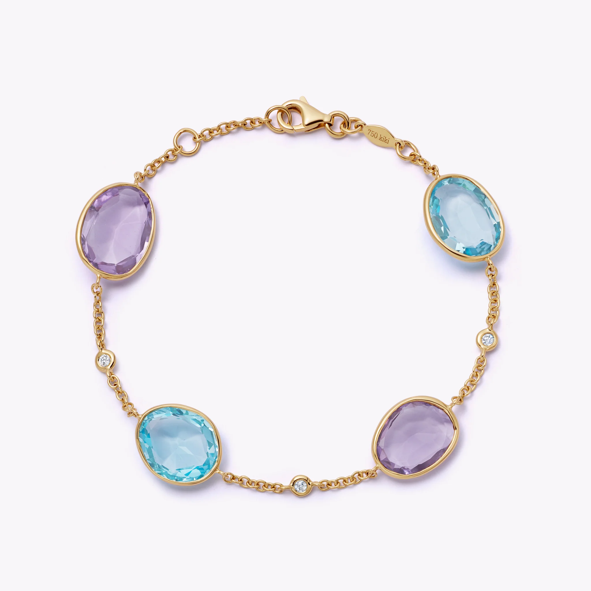 Candy Blue Topaz, Amethyst and Diamond Bracelet
